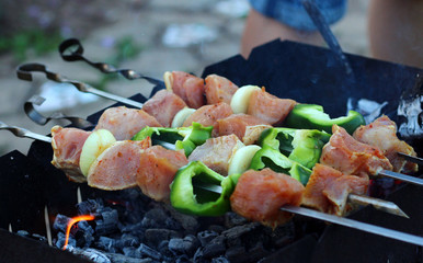 Beef steaks on the grill with flames