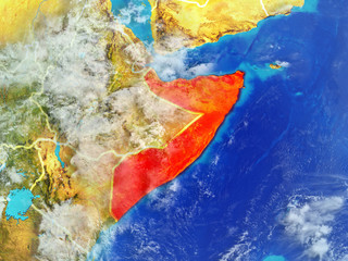 Somalia from space on model of planet Earth with country borders. Extremely fine detail of planet surface and clouds.