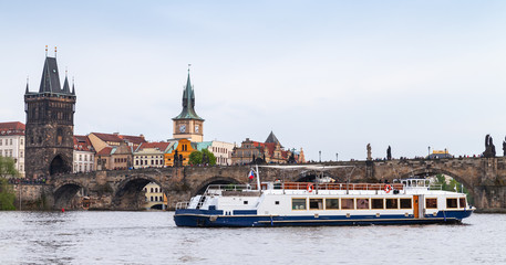 Small passenger ship on Vltava river. Prague