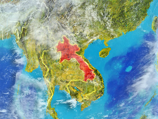 Laos from space on model of planet Earth with country borders. Extremely fine detail of planet surface and clouds.