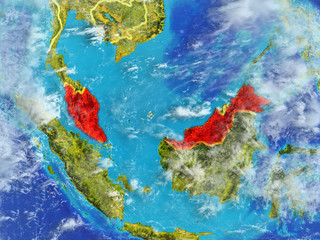 Malaysia from space on model of planet Earth with country borders. Extremely fine detail of planet surface and clouds.
