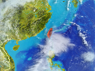 Taiwan from space on model of planet Earth with country borders. Extremely fine detail of planet surface and clouds.