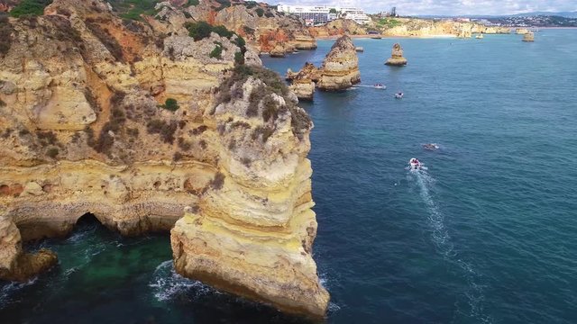 Flight over beautiful mountains near ocean shore