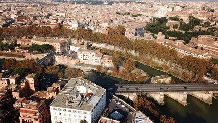 Fototapeta na wymiar Aerial drone photo of famous Tiber river Island or Isola Tiberina in city of Rome, Italy