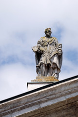 Fototapeta premium Saint Peter the Apostle, statue on facade of the Mantua Cathedral dedicated to Saint Peter, Mantua, Italy 