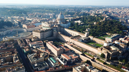 Aerial drone view of Saint Peter's square in front of world's largest church - Papal Basilica of...