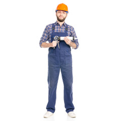 Young man builder industry worker hardhat with a silicone gun on white background isolation
