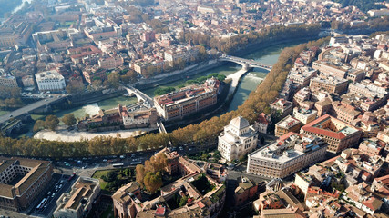 Obraz premium Aerial drone photo of famous Tiber river Island or Isola Tiberina in city of Rome, Italy