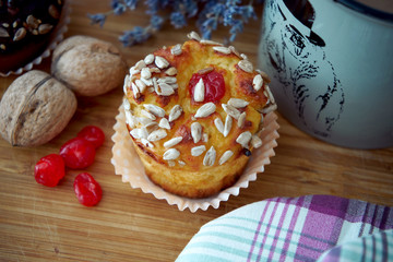 Tasty cupcake lies on a wooden table