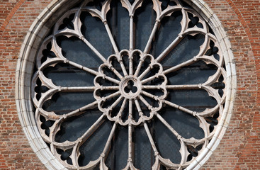 Rose window on Saint Francis church in Mantua, Italy