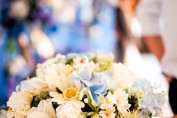 Close up a little white flower and selective focused background for wedding.