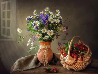 Fotobehang Still life with bouquet of summer wildflowers and strawberries © Iryna