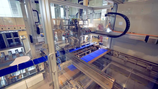 Factory equipment works with solar panels, close up.