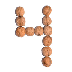 Number four. Figure composed of nuts on a white isolated background.