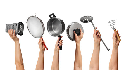 metal kitchen equipment in the hands of people