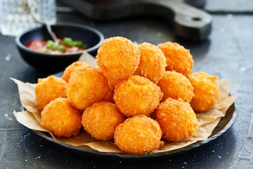  cheese balls with tomato sauce. © ld1976