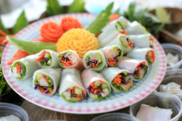 Fresh vegetable rice wraps (Kuay Tiew Lui Suan). Thai noodle rolls wraps vegetables.