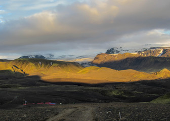 Stunning sunset with and Myrdalsjokull glacier, Katla caldera, Botnar-Ermstur, Laugavegur Trail,...