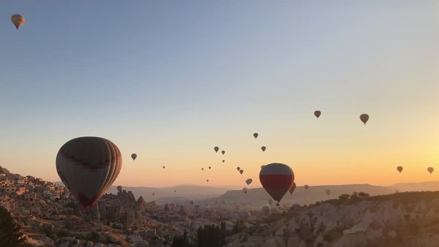 Hot air balloons in Cappadocia at sunrise