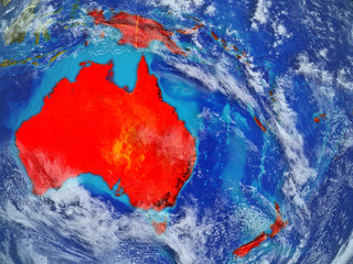 Australia from space on model of planet Earth with country borders. Extremely fine detail of planet surface and clouds.