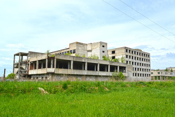 Fototapeta na wymiar The abandoned buildings of the optical-mechanical plant. Rybinsk, Yaroslavl region