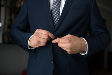 The man is wearing a jacket