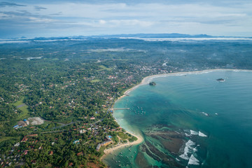 Aerial view of beautiful  tropical coastline and fisherman village