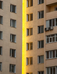Fototapeta na wymiar windows of a modern building with orange walls
