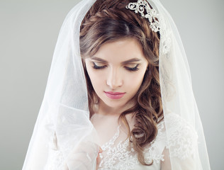 Beautiful bride woman in veil, face closeup female portrait