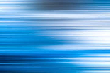 Blurry abstract background with multicolored motion stripes.