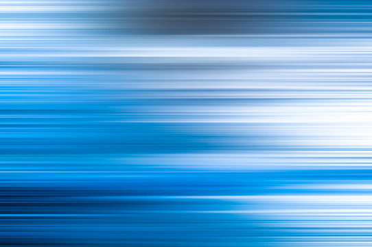 Blurry abstract background with multicolored motion stripes.