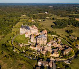Aerial view, village and castle of Biron in the Dordogne region of south west France