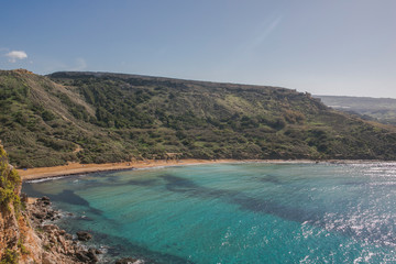 Fototapeta na wymiar Golden beach Malta, famous tourist destination