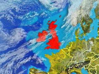 British Isles from space on model of planet Earth with country borders. Extremely fine detail of planet surface and clouds.