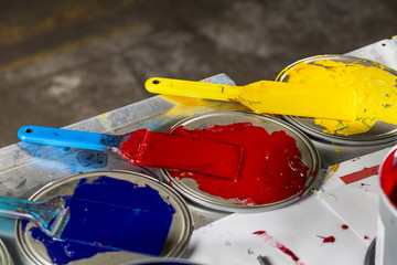 Closeup spatulas in color printing ink. CMYK