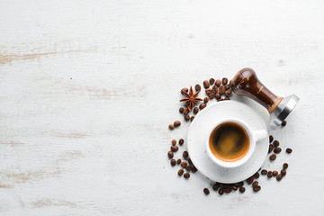 Espresso coffee On a wooden background. Top view. Free copy space.