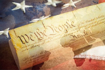 Fototapeta premium Roll of vintage US Constitution, Patriotism, Fourth of July