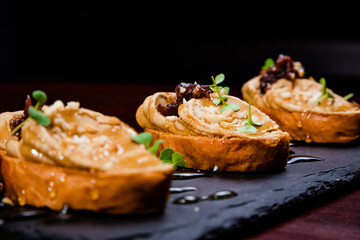 Chicken liver pate with cranberry sauce, served with croutons