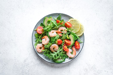 Shrimp avocado arugula salad