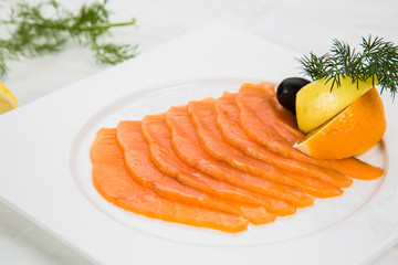 marinated salmon with lemon and orange