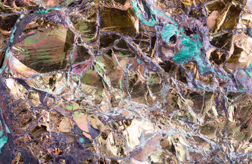 extreme closeup of multicolor pyrite texture