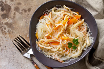 Fresh Squid, Various Spices and Olive Oil on blue concrete or stone table.