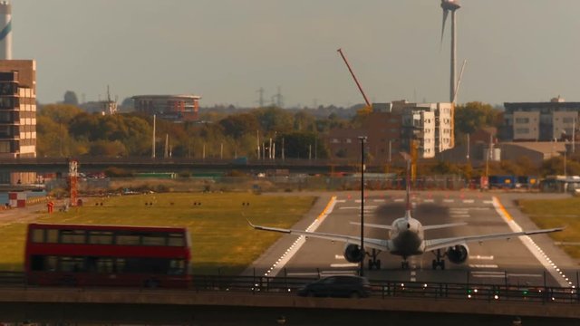London City Airport - Ultra closeup shot of a large airliner landing during daytime on a sunny day