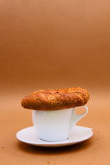 Black coffee with fresh bagel