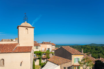 Fototapeta premium Mountain village of Ramatuelle with the church Notre-Dame