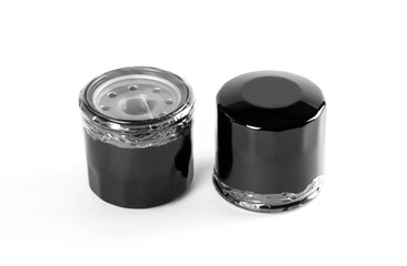 Two oil filters. Close up. Isolated on white background.