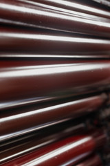 Rolling shafts in the paint of industrial printing machine. Offset printing.