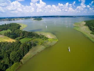 Aerial view of yachts sailing on Swiecajty Lake, Mazury, Poland