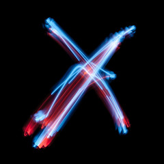 Letter X of the alphabet made from neon sign. The blue light image, long exposure with colored...