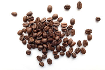 Roasted coffee beans isolated on white background.